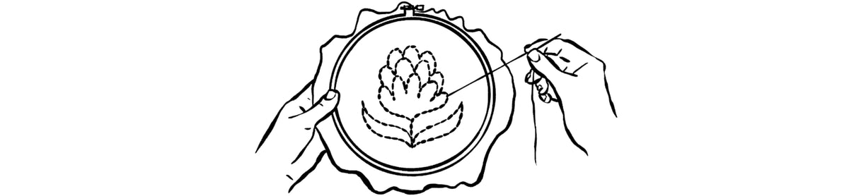black and white illustrated lineart of a hand holding an embroidery hoop with fabric and another hand holding a needle, stitching a flower design on the fabric