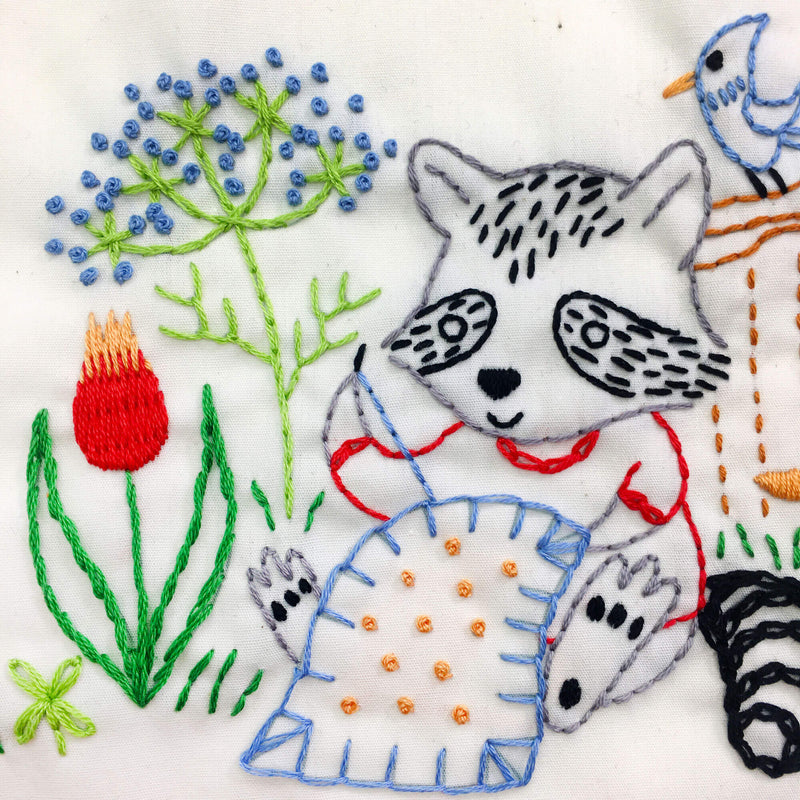 close up image of the stitches on the Stitching Raccoon Sampler embroidery kit from Penguin & Fish